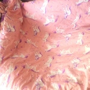 Full-size unicorn bedding set.